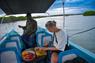 Negombo: Sunset lagoon boat tour with hotel transfers - Monkey Island stop: feeding toque macaques the right way
